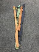 Five two piece fishing rods in carry bags,