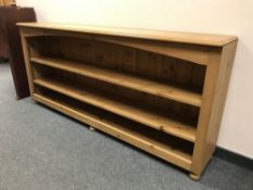 A set of pine low open bookshelves, width 183 cm.