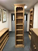 A set of pine narrow bookshelves, height 220 cm.