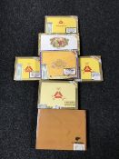 A collection of empty cigar boxes,