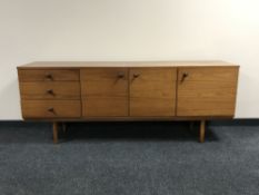 A mid 20th century teak low sideboard