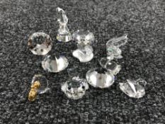 Ten un-boxed miniature Swarovski Crystal figures; pelican bird, prisms,