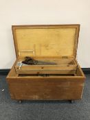 A large pine box containing joiners hand tools