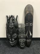 Three carved tribal hardwood masks