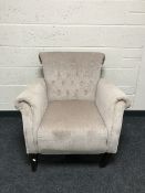 A button back armchair