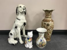 A large figure of a Setter together with a pottery figure of a cat,