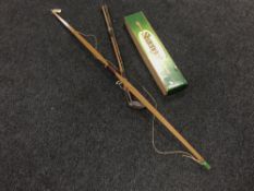 A Slazenger archery bow together with a box containing Slazenger arrows and three vintage hickory