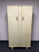 A mid twentieth century double door wardrobe