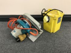 A 110v transformer and a Wolf electric saw