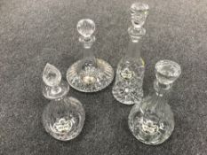 Four lead crystal decanters with labels
