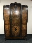 A walnut single door wardrobe