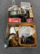 Two boxes of plate stands, hangings, Hornsea teapot, tins,