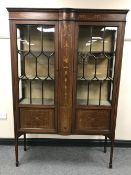 A Victorian inlaid mahogany display cabinet