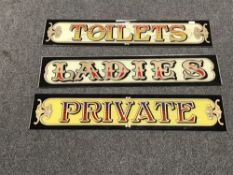 Three glass signs - Private, Toilets,
