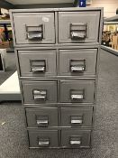 A metal ten drawer index chest