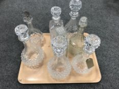 A tray of glass decanters (Q)