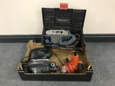 A box of three electric power tools,