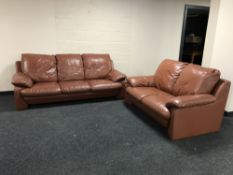 A brown leather three seater and two seater settee