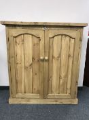 A reclaimed pine double door cabinet,