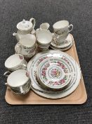 A tray containing a twenty one piece Dutchess Nanking china tea service,