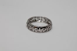 An 18ct white gold Versace ring, size P, 4.5g. CONDITION REPORT: The ring is 22.