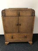 An oak linen chest CONDITION REPORT: This measures 108cm high,