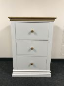 A Corndell contemporary three drawer chest with oak top and handles