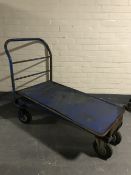 A metal framed flatbed trolley