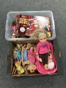 Two boxes containing assorted dolls and a High School Musical dance mat