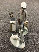 A Lladro figure and a Nao figure plus one other