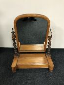A Victorian dressing table mirror with barley twist column supports