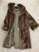 A Lady's full length brown fur coat CONDITION REPORT: This appears to be mink.