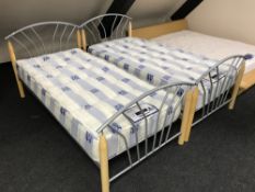 A pair of contemporary three foot bed frames with interiors,