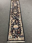 A Persian pictorial runner on blue ground,