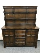 An Ercol dark elm dresser,