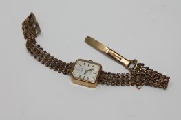A lady's 9ct gold Rotary wristwatch upon 9ct gold bracelet CONDITION REPORT: This