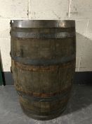 A coopered oak whiskey barrel