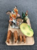 A tray containing a pair of Staffordshire flat backed figures, infantry men on horseback,
