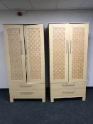 A pair of contemporary beech double door wardrobe,