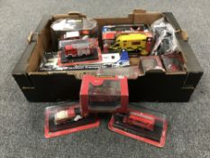 A box containing approximately fifteen emergency response vehicles (eleven boxed)