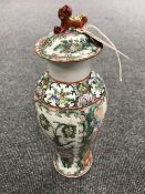 A 20th century Chinese famille rose lidded vase, with flower and bird decoration,