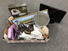 A box containing mobile phones, bathroom mirror, ornaments, a jumbo universal remote, etc,
