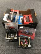A box containing assorted boxed die cast motorbikes