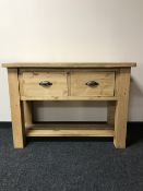 A reclaimed pine kitchen preparation table fitted two drawers