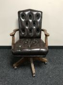 A ducal pine brown button leather swivel office chair