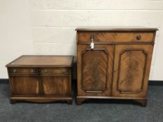 A mahogany Siesta double door cabinet, fitted a drawer,