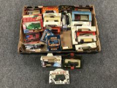 A box containing approximately twenty eight boxed die cast vehicles,