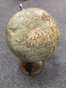 An early twentieth century French globe on wooden stand (a/f)