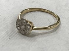 An 18ct gold diamond cluster ring CONDITION REPORT: The ring is in good condition.