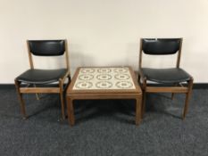 A late twentieth century teak tile top table,